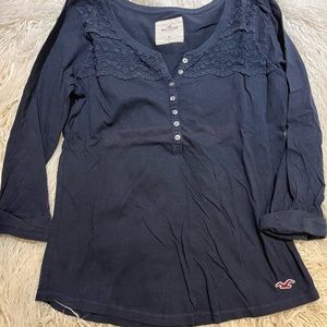 Three quarter length sleeve buttoned top